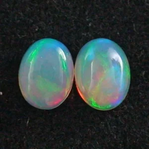 Welo Opal Pärchen 1,04 u. 1,25 ct Multicolor Milchopale Opale