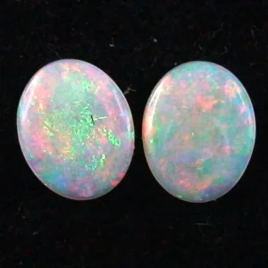 Black Crystal Opal Pärchen 1,01 ct. + 1,12 ct. Multicolor Vollopale